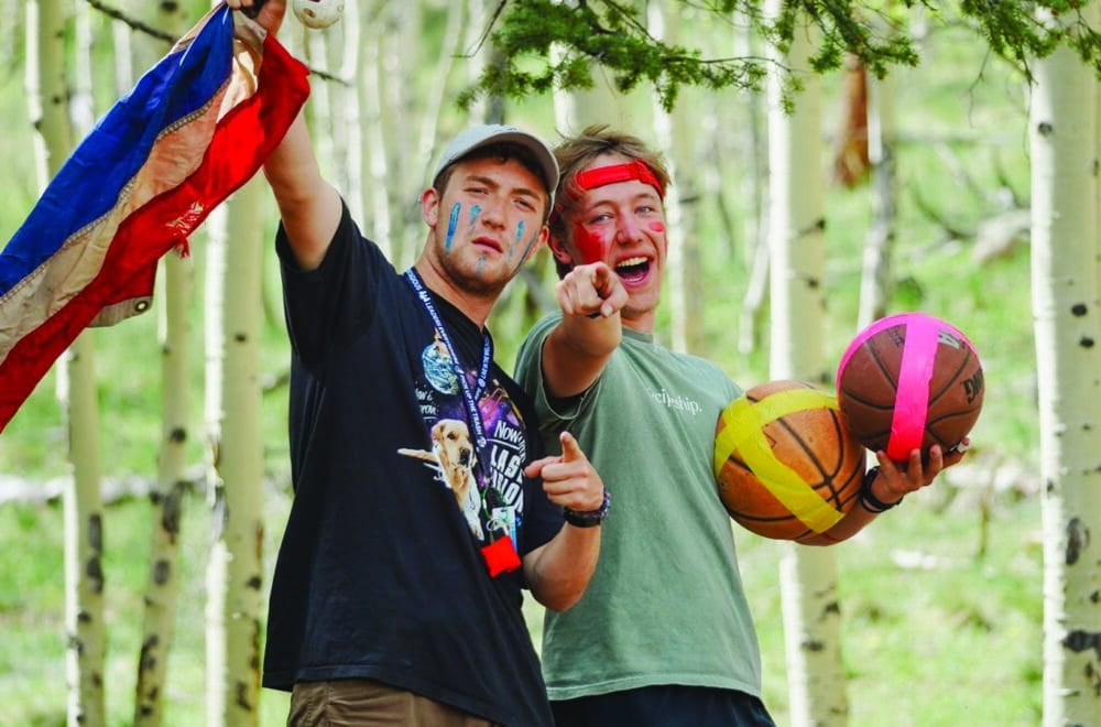 Nathan (left) leading games with another counselor at Eagle Lake Camps.