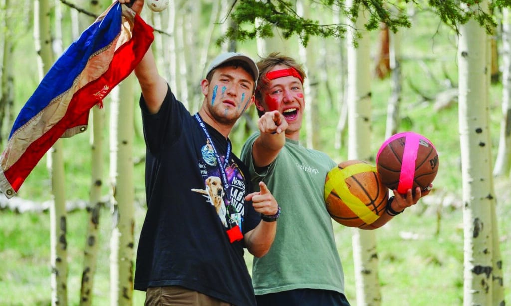Nathan (left) leading games with another counselor at Eagle Lake Camps.