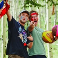 Nathan (left) leading games with another counselor at Eagle Lake Camps.