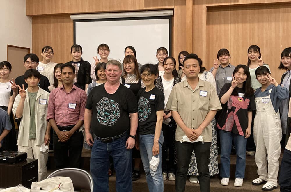 Marc and Yumiko Leis standing with a group of Christians in Japan